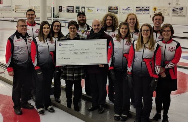 Pictured: Members of the 2018/19 Vikings Curling Team along with Coach Andrew McIntosh, Assistant Coach Steve Lindberg, and Principals Beth Kushnerick and Scot Lorenson of Grant Thornton LLP.
